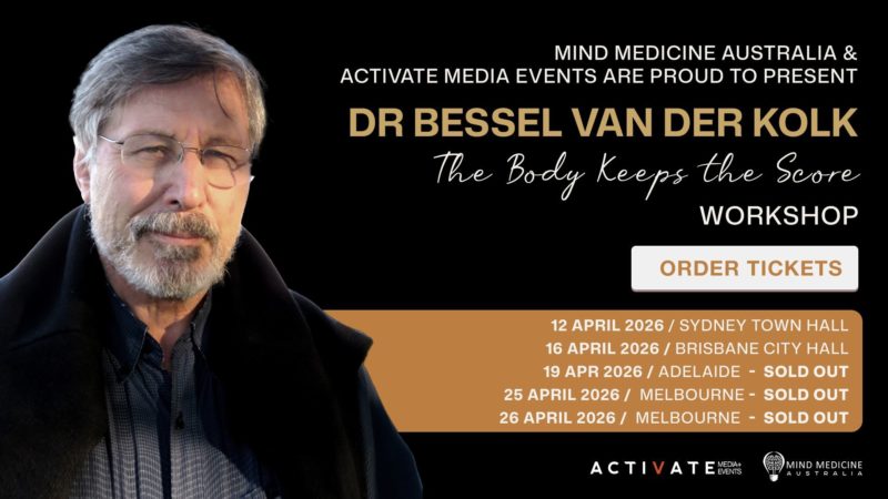 child blowing dandilions